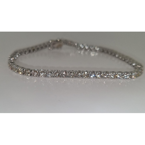 56 - 6.05 Carat Diamond Tennis Bracelet. Certified.