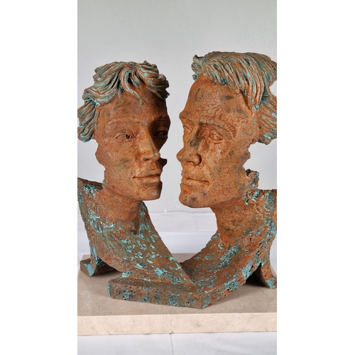 63 - Sculpture of Man and Woman Titled 