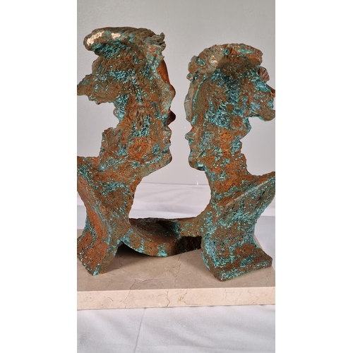 63 - Sculpture of Man and Woman Titled 