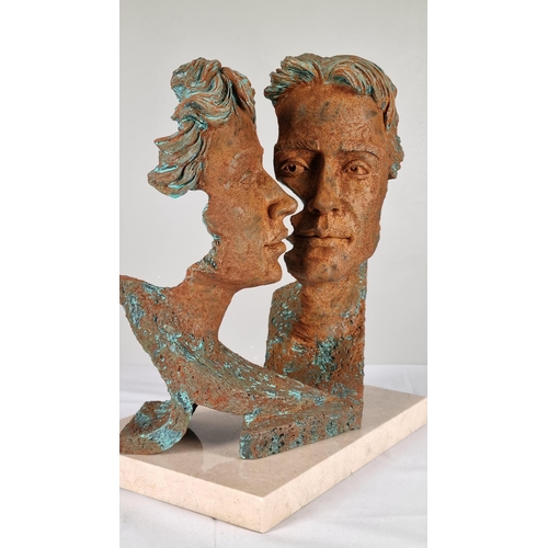 63 - Sculpture of Man and Woman Titled 