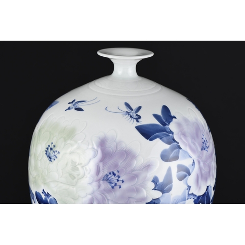 209 - Blue and White Floral Vase with wooden base