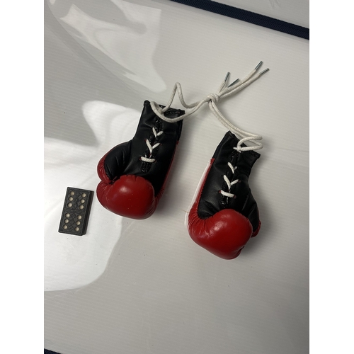 336 - Leon Spinks Pair of signed mini boxing gloves