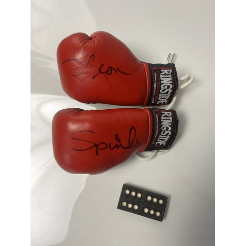 336 - Leon Spinks Pair of signed mini boxing gloves