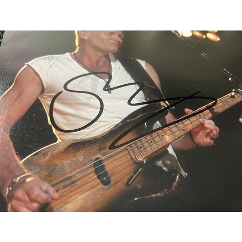 294 - STING Signed photograph