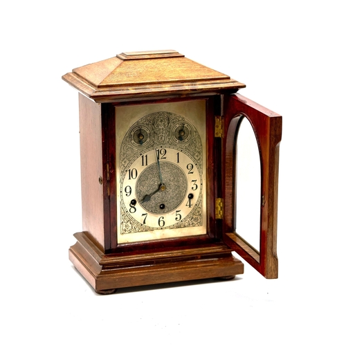 47 - Junghans (DEU) Oak Mantle Clock. Attractive Westminster chime.  Has key Works but looses time of a 2... 