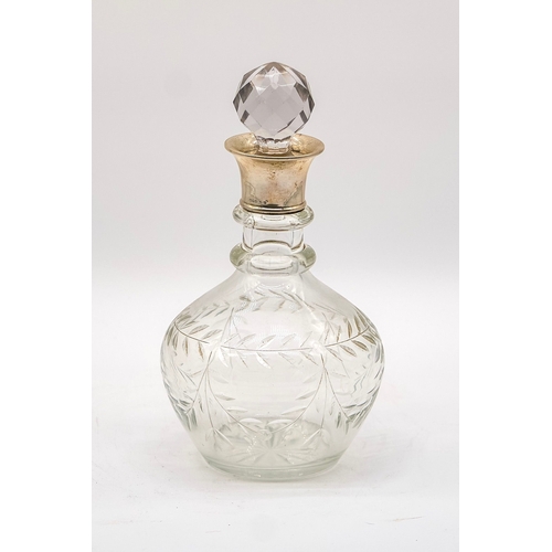 55 - Attractive Wine Decanter with silver neck and glass stopper with decorated cut glass