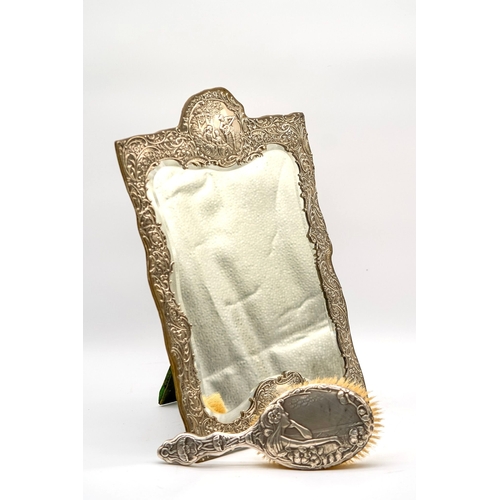 58 - Silver with Green Velvet back Bevelled Mirror. With quality ornamentation and a depiction of lute pl... 