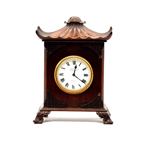 113 - Edwardian Eastern Style Clock. Mahogany Works well with good movement and key