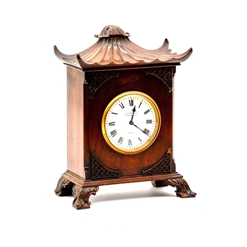 113 - Edwardian Eastern Style Clock. Mahogany Works well with good movement and key