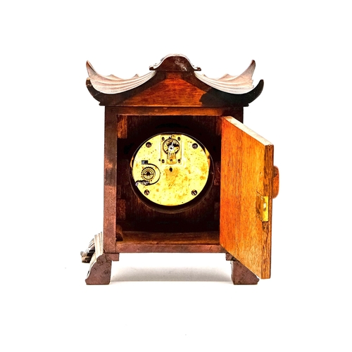 113 - Edwardian Eastern Style Clock. Mahogany Works well with good movement and key