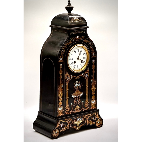 112 - Attractive French Mantel Clock With Mother Of Pearl and brass inlay and ebonized. Quality Movement a... 