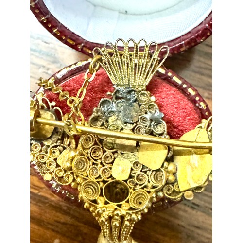 138 - A beautiful yellow metal Phoenix brooch testing for 18ct gold. Some damage and repairs also a missin... 