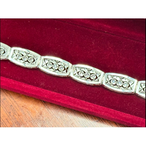 122 - Diamond 1930's style white gold Bracelet and matching Ear Rings26.9g