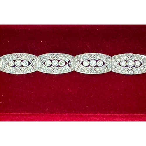 122 - Diamond 1930's style white gold Bracelet and matching Ear Rings26.9g