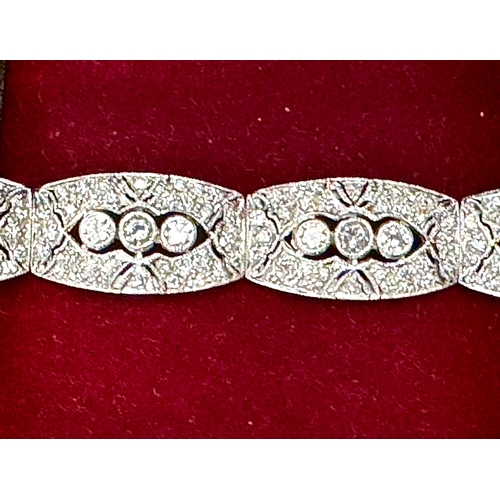 122 - Diamond 1930's style white gold Bracelet and matching Ear Rings26.9g