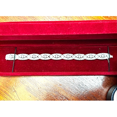 122 - Diamond 1930's style white gold Bracelet and matching Ear Rings26.9g