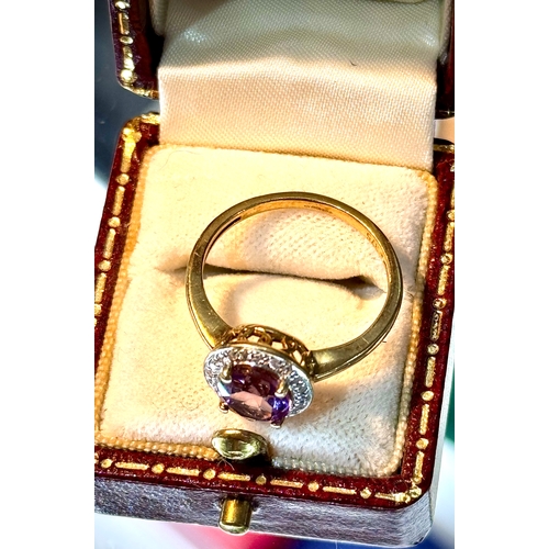 126 - Amethyst and Diamond 18ct Gold Ring.The quality and colour of the amethyst is good quality and a att... 