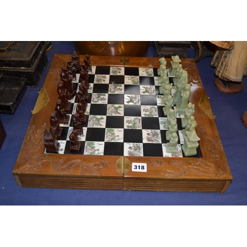 318 - ORNATE CHINESE FAUX JADE CHESS SET IN FOLDING TRAVEL CASE WITH BOARD INSET, FITTED 2 DRAWERS