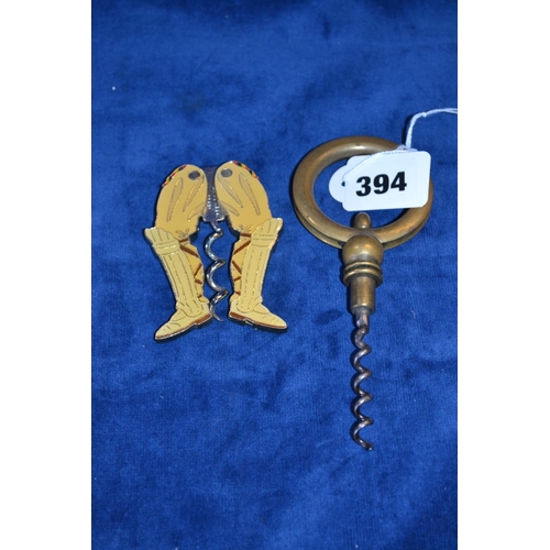 394 - NOVELTY CORKSCREW IN FORM OF CRICKETERS LEGS AND BRASS CORKSCREW