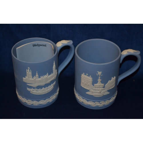 78 - WEDGWOOD BLUE AND WHITE JASPERWARE 1971 CHRISTMAS MUG AND 1974 CHRISTMAS MUG