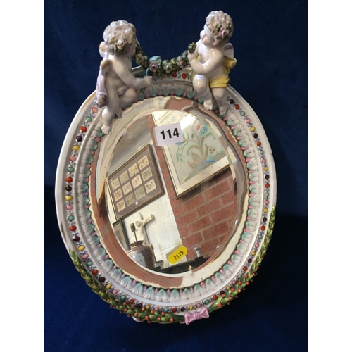 114 - CONTINENTAL OVAL PORCELAIN BEVELLED DRESSING TABLE MIRROR WITH ENAMEL BEADWORK DECORATION, LAUREL LE... 