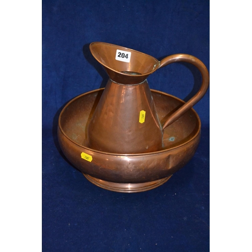 204 - BEATEN COPPER TOILET JUG AND BOWL