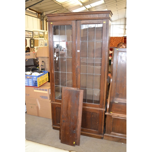 685 - EDWARDIAN OAK DISPLAY CABINET WITH ADJUSTABLE SHELVES ENCLOSED BY PAIR OF LEADED LIGHT PANEL DOORS