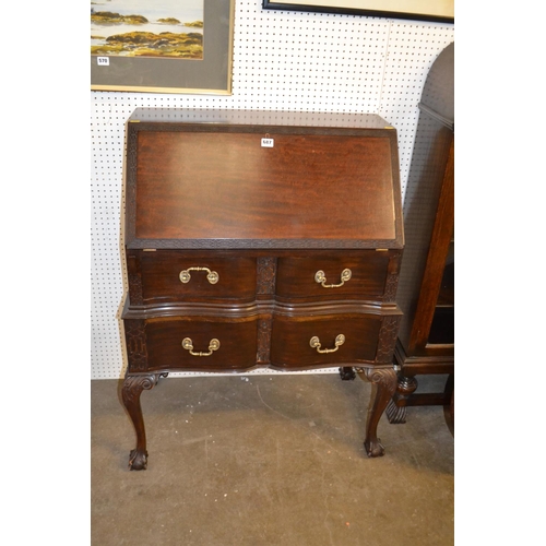 687 - REPRODUCTION CARVED MAHOGANY BUREAU FITTED 2 SERPENTINE FRONTED DRAWERS, ON CARVED CABRIOLE LEGS