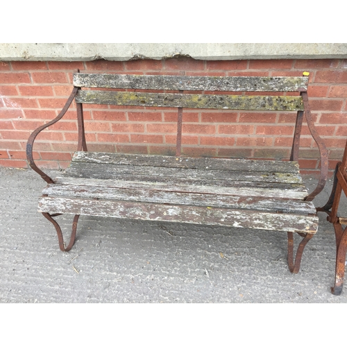 703 - IRON STRAPWORK AND SLATTED GARDEN BENCH