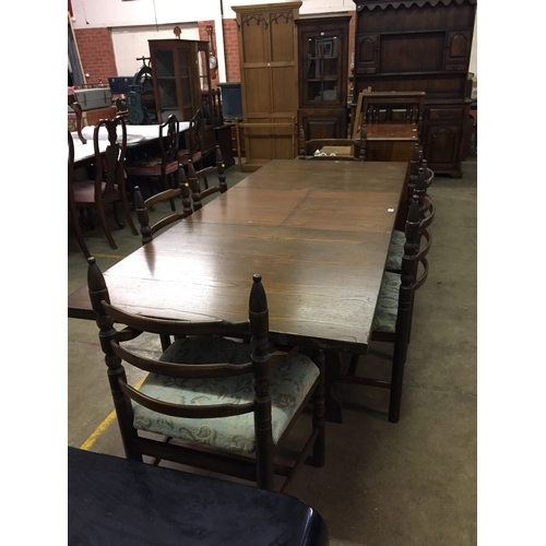 636 - EXTENDING OAK REFECTORY DINING TABLE AND SET OF 6 LADDER BACK DINING CHAIRS