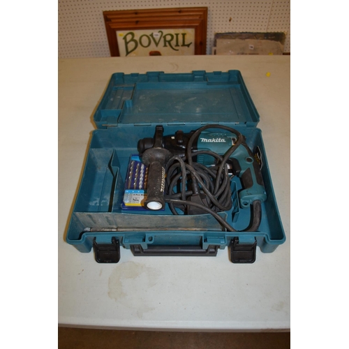 81 - MAKITA ELECTRIC DRILL HR1830 AND 8 PIECE MASONRY DRILL SET