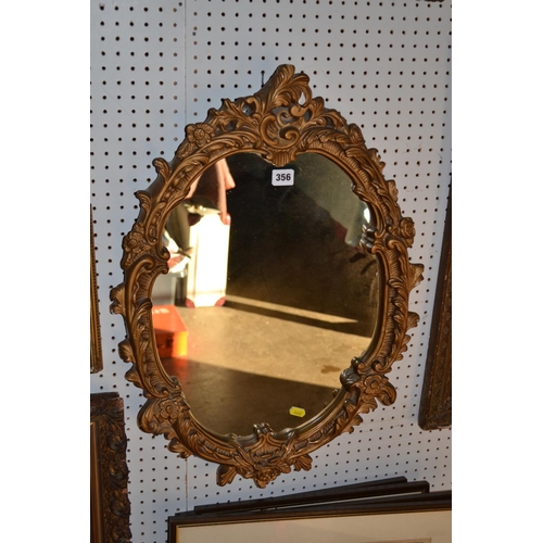 356 - OVAL GILT FRAMED WALL MIRROR