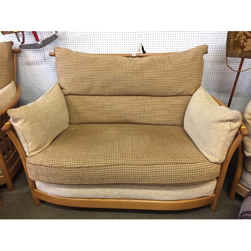 561 - ERCOL GOLDEN OAK 2 SEATER SETTEE, PAIR OF ARMCHAIRS AND PAIR OF STOOLS