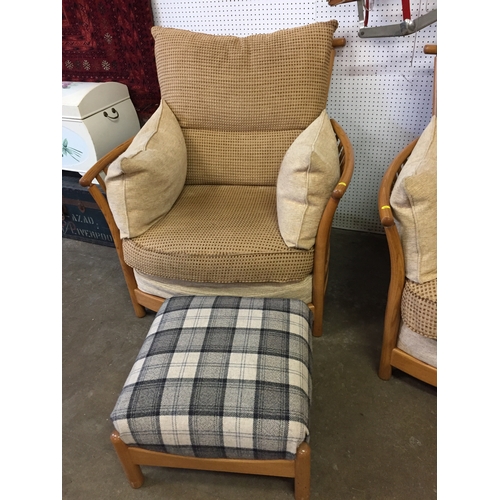 561 - ERCOL GOLDEN OAK 2 SEATER SETTEE, PAIR OF ARMCHAIRS AND PAIR OF STOOLS