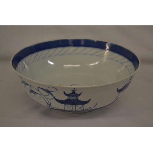 61 - BLUE AND WHITE BOWL DECORATED GARDEN SCENE (CHIPPED) (23CM)