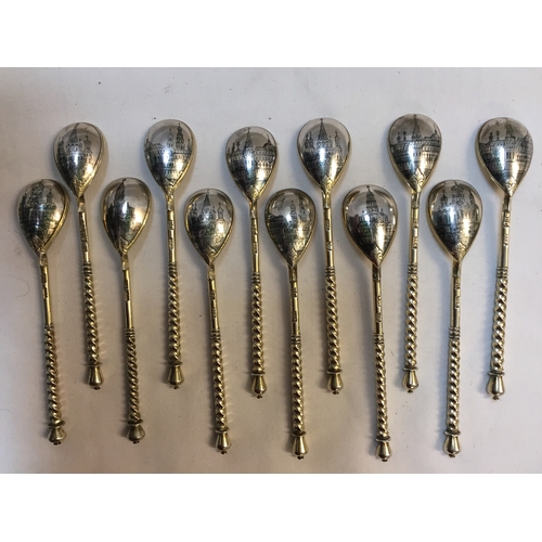 355 - SET OF 12 RUSSIAN PARCEL GILT SILVER TEASPOONS WITH SHAPED BOWLS DECORATED WITH SCENES OF MOSCOW LAN... 