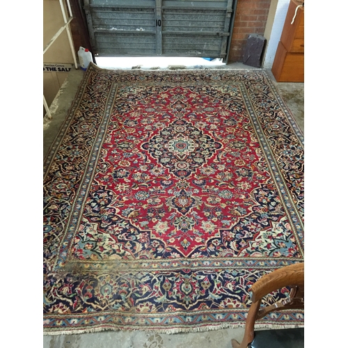 568 - LARGE BORDERED PERSIAN DESIGN CARPET 250CM X 337CM