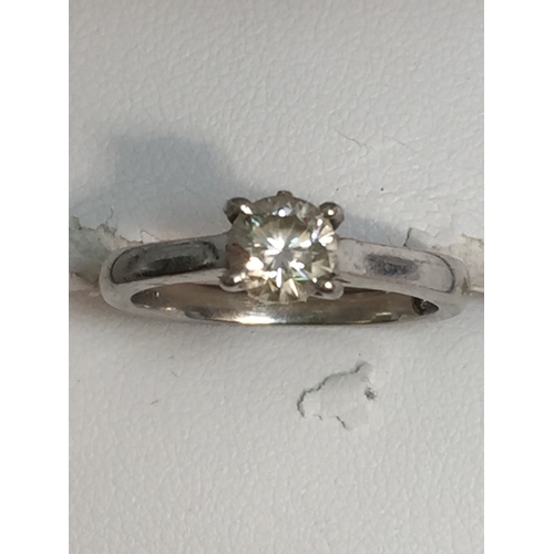 450 - LEO PLATINUM AND SOLITAIRE ENGAGEMENT RING 0.69CT, CLARITY US2, FINISH VERY/VERY GOOD