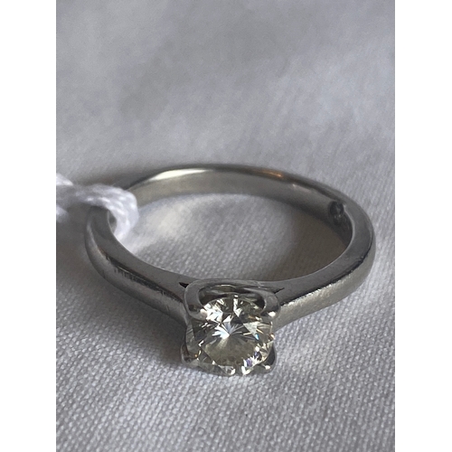 450 - LEO PLATINUM AND SOLITAIRE ENGAGEMENT RING 0.69CT, CLARITY US2, FINISH VERY/VERY GOOD