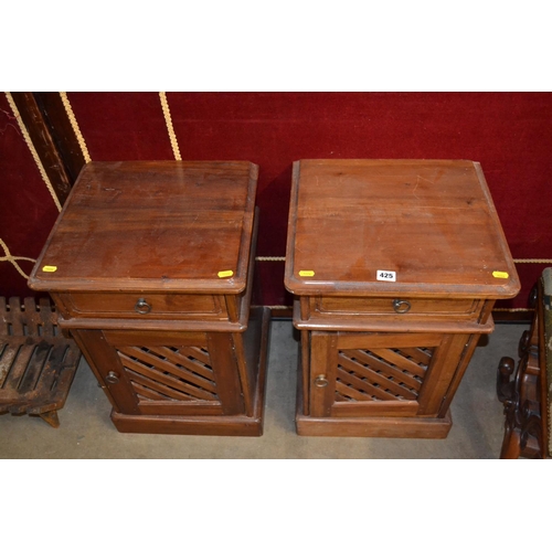 425 - PAIR OF HARDWOOD BEDSIDE CUPBOARDS FITTED DRAWERS WITH LATTICE PANEL DOORS