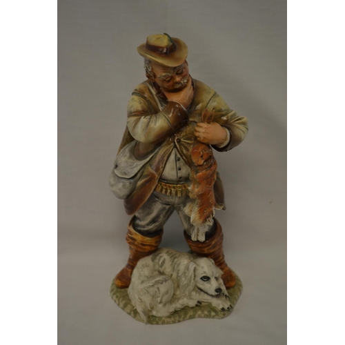 62 - CAPODIMONTE PORCELAIN FIGURE OF GAME KEEPER HOLDING HARE WITH HOUND AT HIS FEET