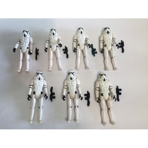 36 - 7 STAR WARS STORM TROOPERS, SIX BLACK AND 1 BLUE STORM TROOPER BLASTERS, HONG KONG 1977