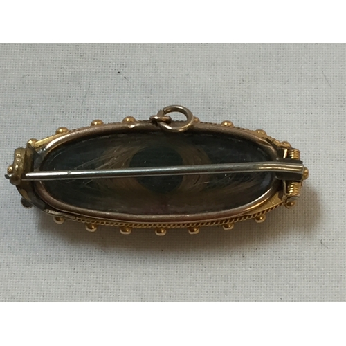 313 - VICTORIAN 9CT GOLD JET MOURNING BROOCH WITH STAR AND SEED PEARL MOUNT (LOCK OF HAIR IN BACK)