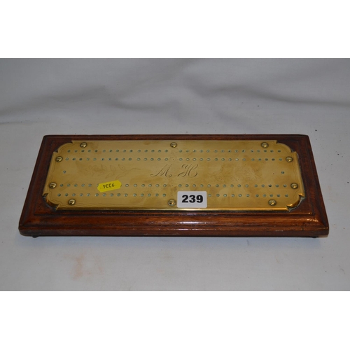 239 - 19TH CENTURY BRASS CRIBBAGE BOARD INITIALLED M.H ON MAHOGANY BASE