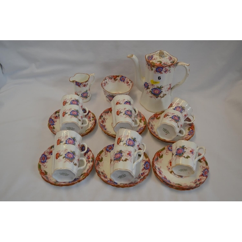 6 - CAULDON CHINA COFFEE SERVICE WITH FLORAL DECORATION COMPRISING 11 CUPS, 12 SAUCERS, TEAPOT, SUGAR AN... 