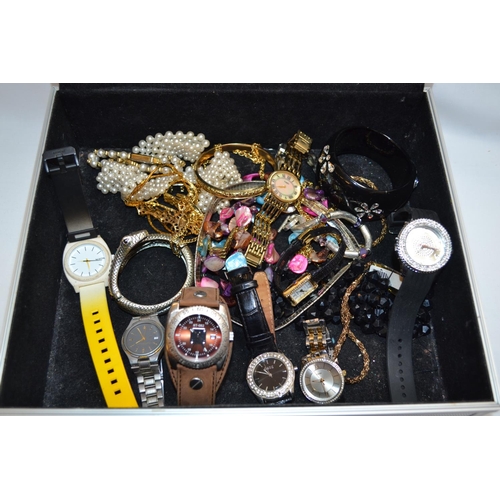 36 - METAL JEWELLERY CASE OF WATCHES AND JEWELLERY