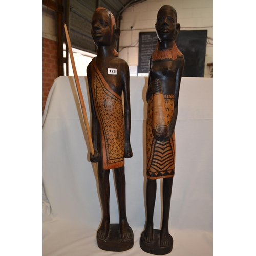 128 - PAIR OF CARVED HARDWOOD MASAI FIGURES OF WARRIOR WITH SPEAR AND WOMAN HOLDING VESSEL