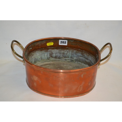 202 - 19TH CENTURY OVAL COPPER PLANTER WITH 2 BRASS HANDLES