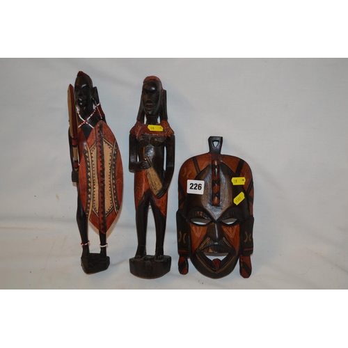 226 - 2 CARVED MASAII FIGURES AND SMALL FACE MASK