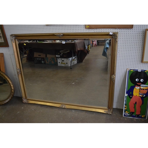 377 - MODERN BEVELLED WALL MIRROR IN GILT FRAME 120CM X 90CM